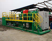 離心機通過化學(xué)絮凝處理油基污泥